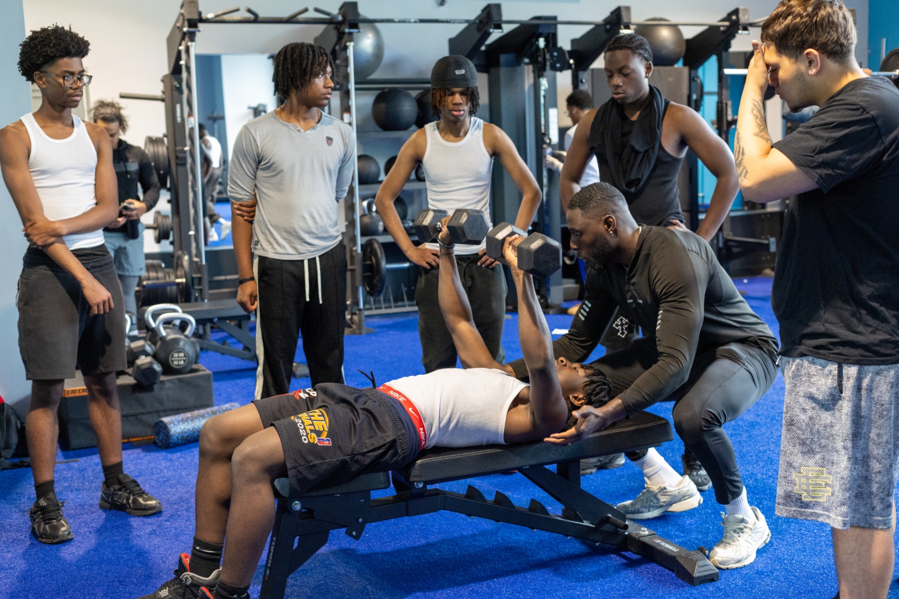 BILLY mentor coaching a young man in a fitness session